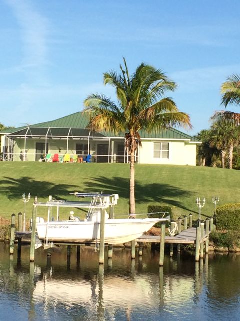 8.49am nice house with colorful chairs