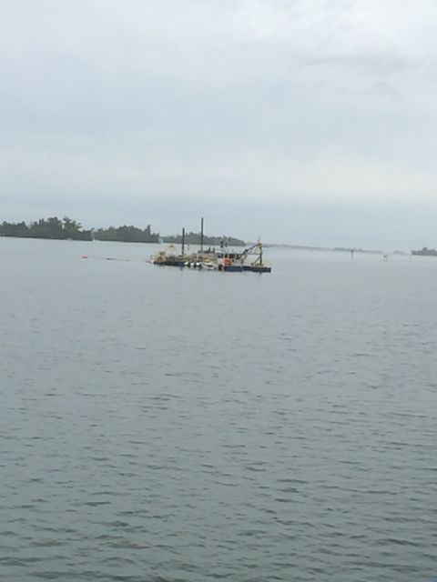 dredger - blocking the channel = 10.06am