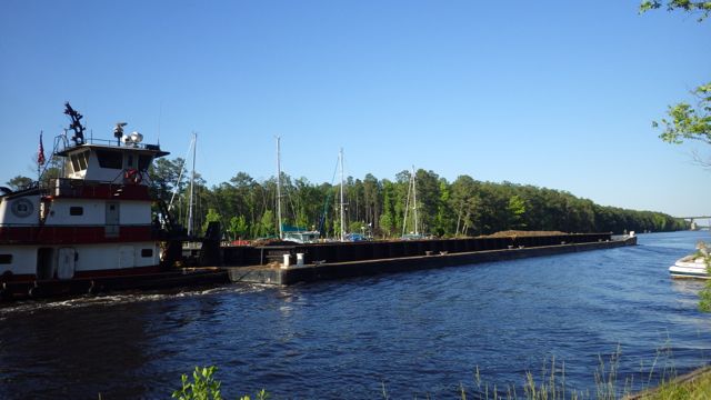 18.09 - 6.09pm - barge pushing metal scrap?  5-22-15