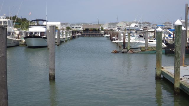 dredger in the fareway at Utsche Marina